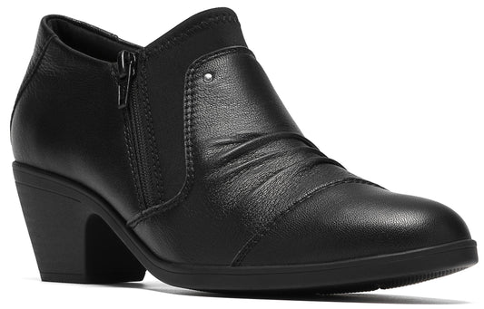 A black leather ankle boot with a block heel, a side zipper, and a gathered texture on the upper.