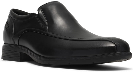 A black leather slip-on dress shoe with a moccasin-style toe seam, low heel, and a thick black sole.