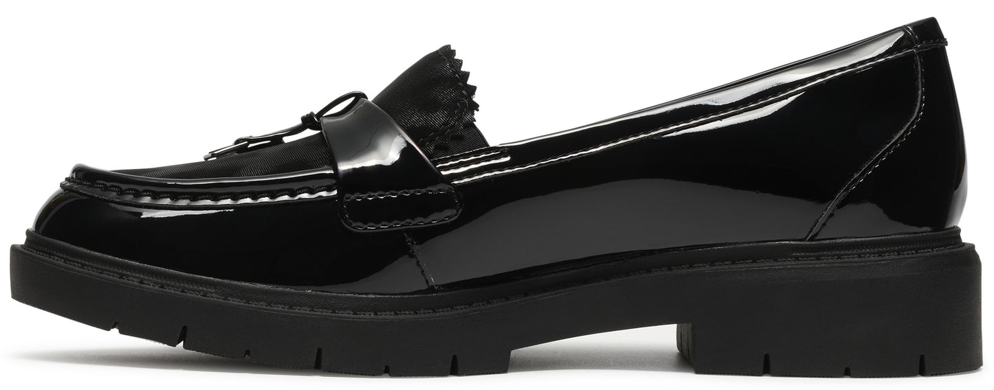 A black patent leather loafer with a thick, lugged rubber sole and a classic penny slot strap across the vamp.