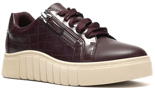 A dark burgundy, croc-embossed leather platform sneaker with a side zipper detail, matching laces, and a thick, ridged, off-white rubber sole.