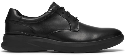 A black leather lace-up derby shoe with a thick, matching black rubber sneaker-style sole, viewed from the side.