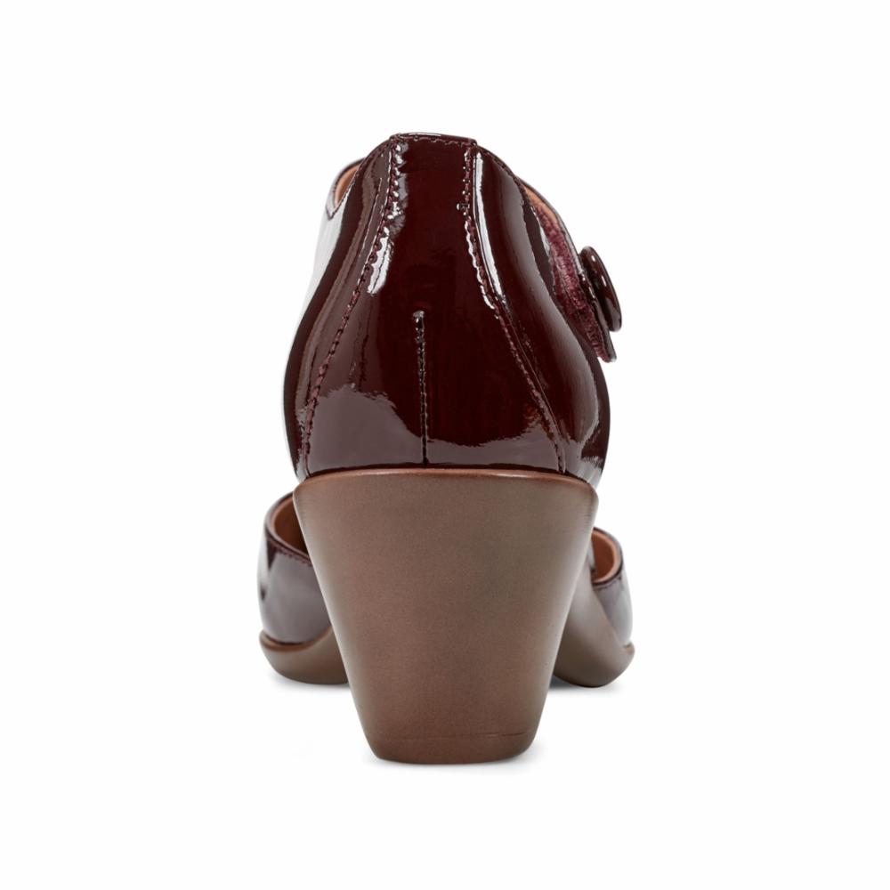 Dark red patent leather Mary Jane heel with an ankle strap.
