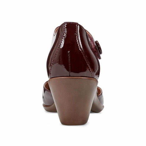 Dark red patent leather Mary Jane heel with an ankle strap.