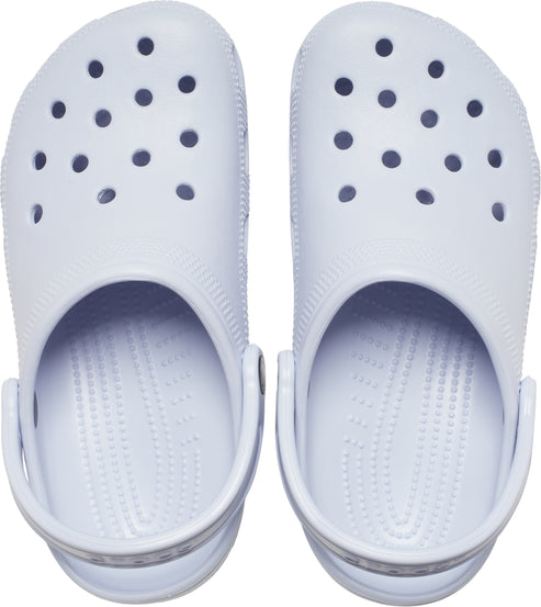 Pair of light blue clogs with multiple holes on the top.