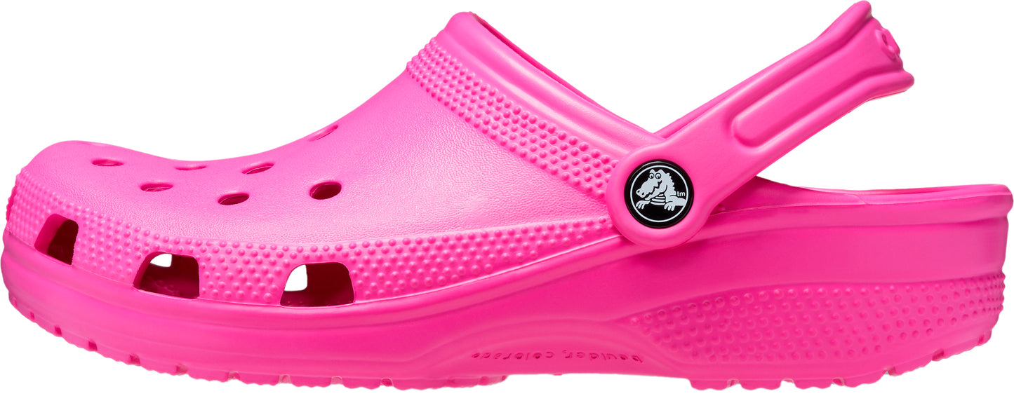 Pink Crocs clog shoe with holes.