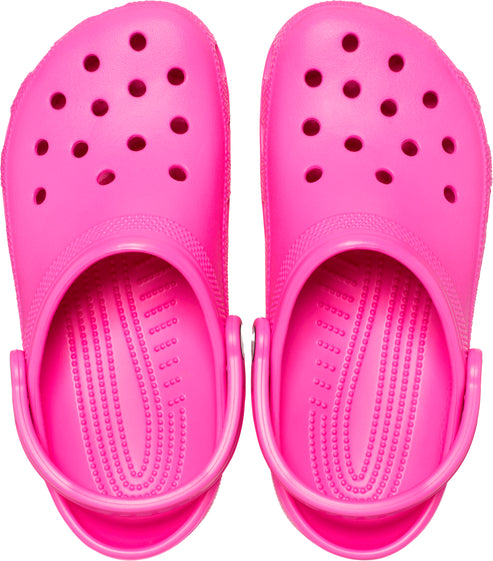Top-down view of bright pink, rubber clogs with ventilation holes.