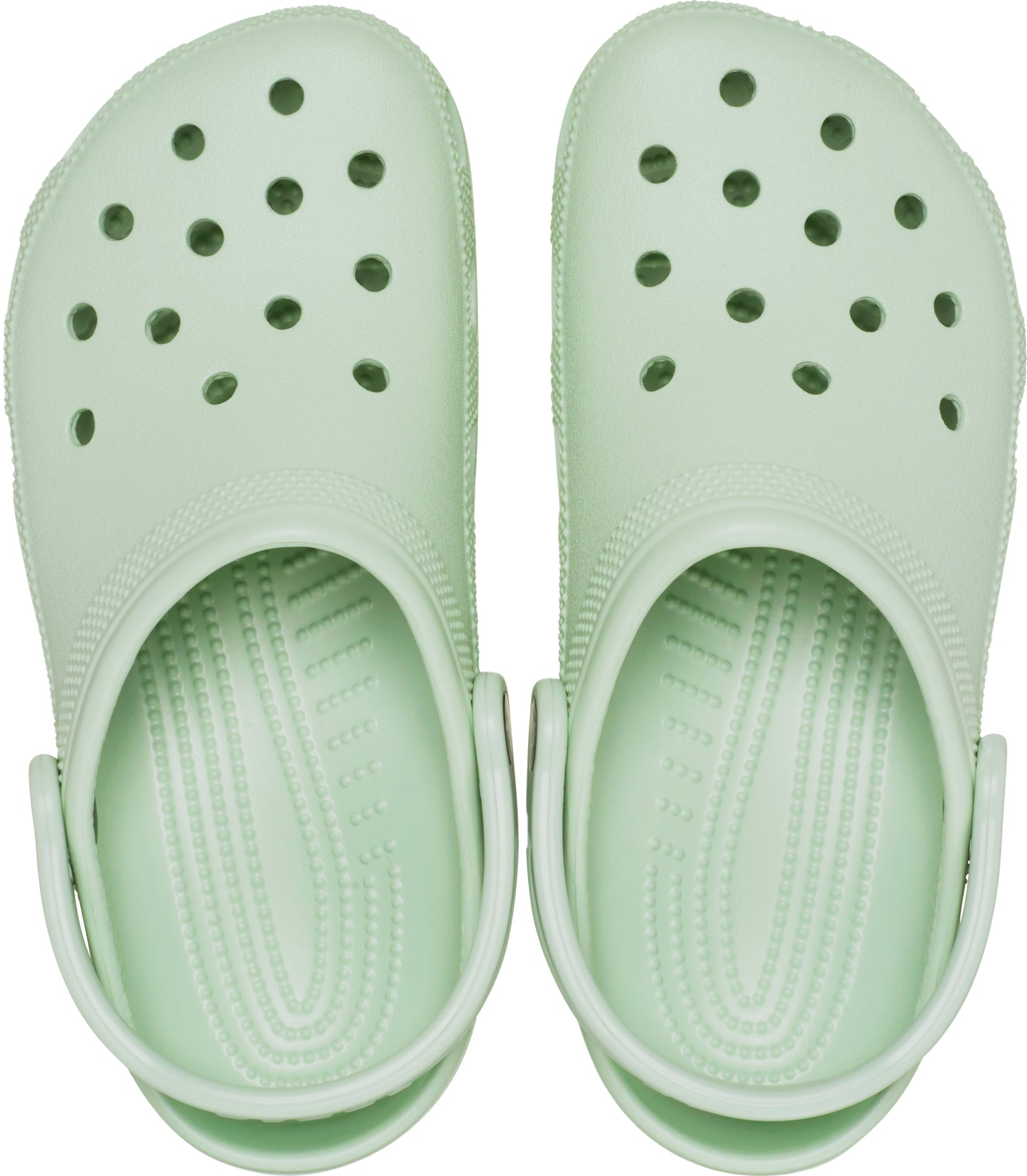 Pair of light green clogs with ventilation holes.