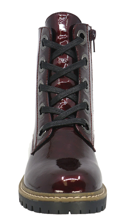 Front view of a shiny dark red boot with black laces.