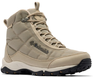 A tan Columbia high-top hiking boot with quilted fabric panels, a lace-up closure, and a rugged black rubber sole.