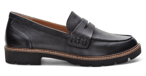 Black leather penny loafer with thick lug sole.