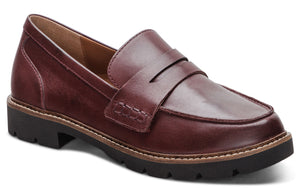 Burgundy leather penny loafer with a black lug sole.