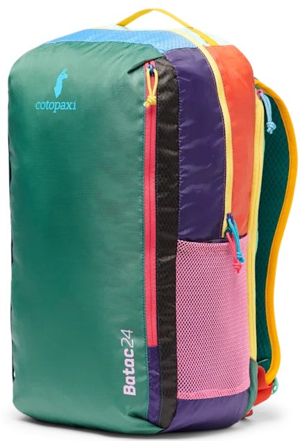 A colorful, multi-paneled 24-liter backpack with a teal main front, a purple side panel, an orange upper section, a pink mesh side pocket, and yellow straps, with "Batac24" and a llama logo printed on the front.