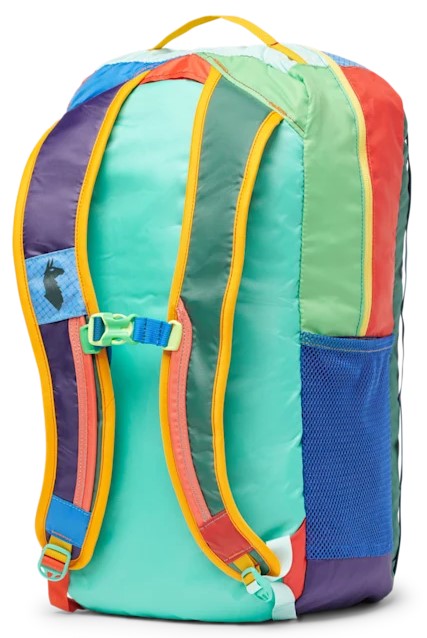 A colorful, multi-paneled backpack shown from the rear, featuring a bright turquoise back panel, padded shoulder straps with yellow trim and a sternum strap, and a blue mesh side pocket.