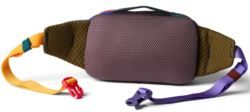 A colorful fanny pack shown from the back, featuring a purple mesh back panel, olive green patterned sides, a yellow strap with a red buckle on the left, and a purple strap with a purple buckle on the right.