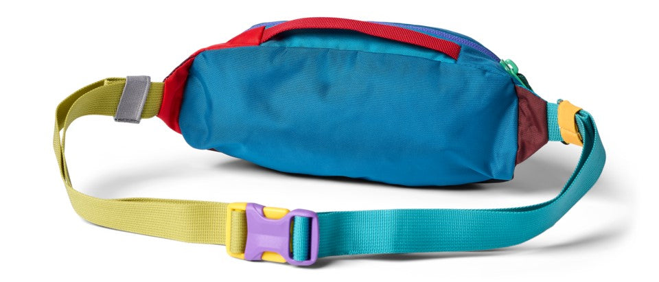 A colorful fanny pack with a clasp and an adjustable strap.