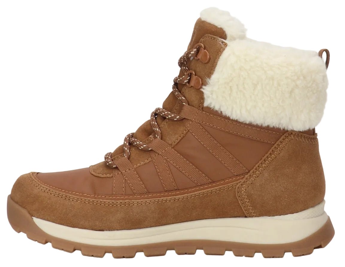 A tan-colored, lace-up winter ankle boot with a fuzzy, white faux-shearling cuff, a thick off-white midsole, and a lugged outsole.