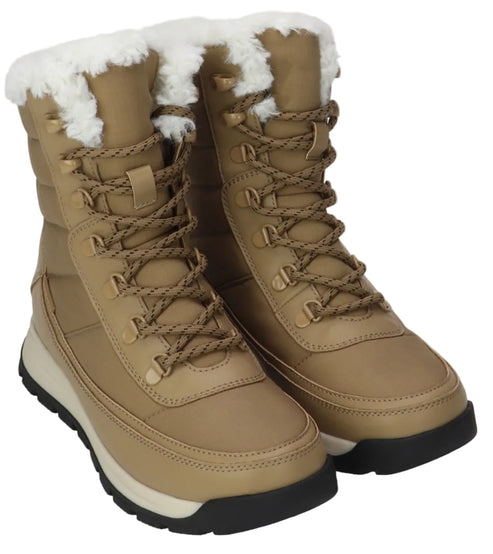 A pair of tan, mid-calf winter boots with white faux-fur trim at the top, featuring quilted uppers, brown lace-up closures with metal eyelets, and thick black rubber lug soles with an off-white midsole layer.