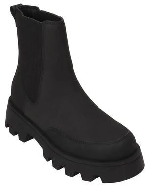 A black ankle-length Chelsea boot with a thick, lug-sole platform, round toe, and side elastic gore panels.