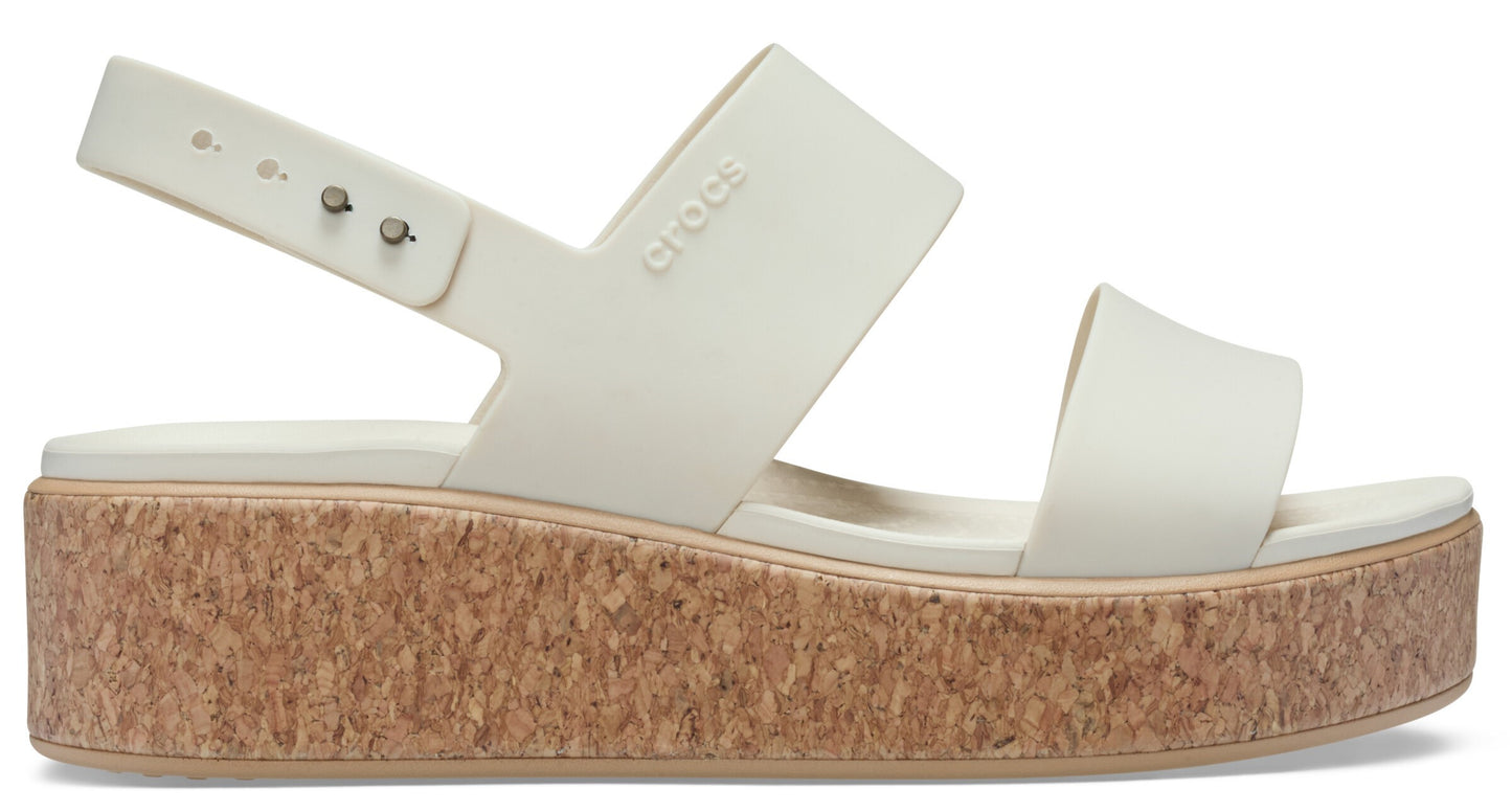 Platform sandal with two wide off-white straps and a cork midsole.