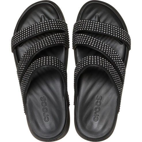 Top-down view of black sandals with three studded straps.