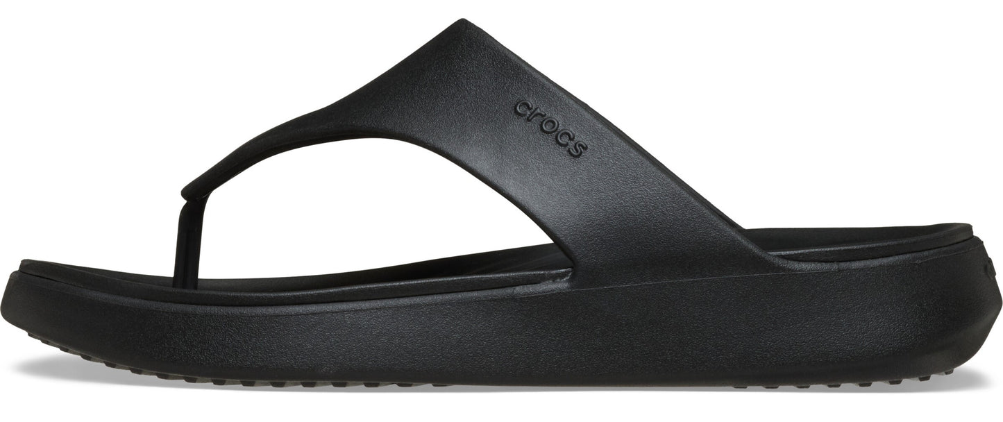 A black thong sandal.