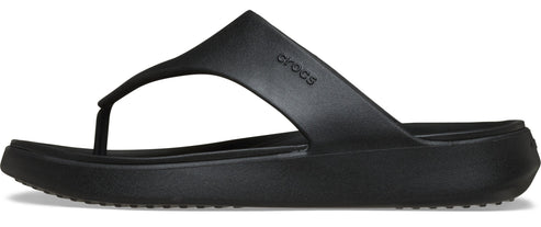A black thong sandal.