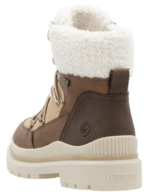 Back view of a high top brown boot with a tan and white furry collar and off-white lug sole.