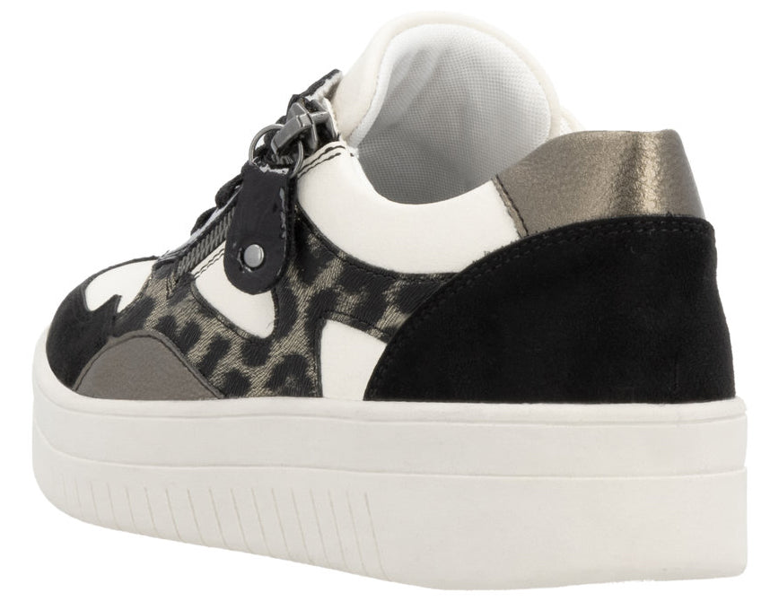 Angled view of a platform sneaker with white sole and black and white animal print upper, silver back accent and zipper.