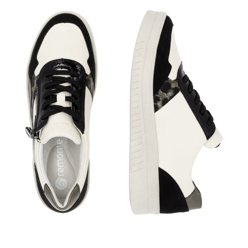 Top-down and side views of a white, black, and grey sneaker with patterned accents.