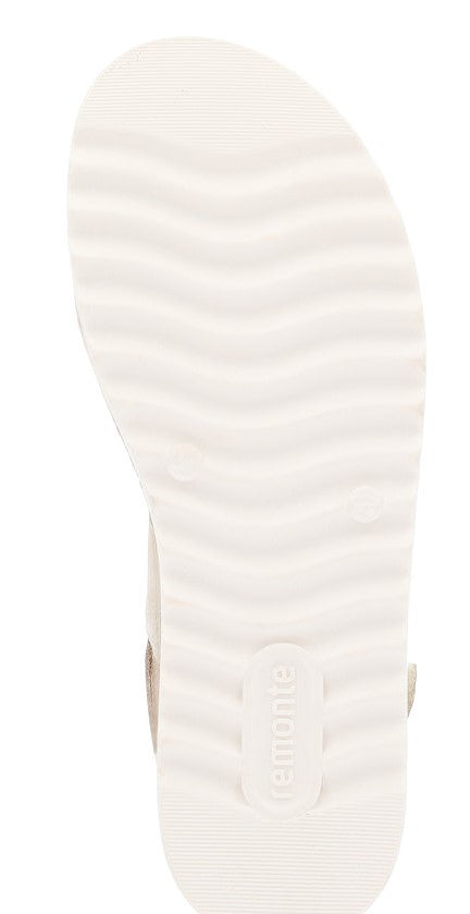 Bottom view of a flat sandal with a white, wavy-patterned sole and the text "remonte".