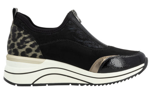 Black slip-on sneaker with animal print heel, shiny toe box, and white wedge sole.