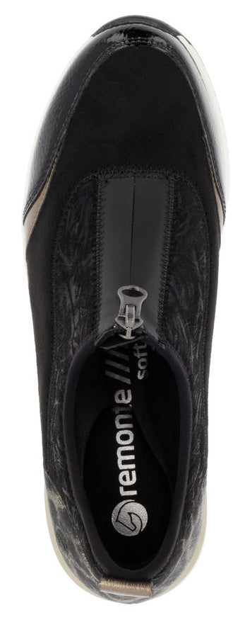 Black shoe with a visible zipper detail.