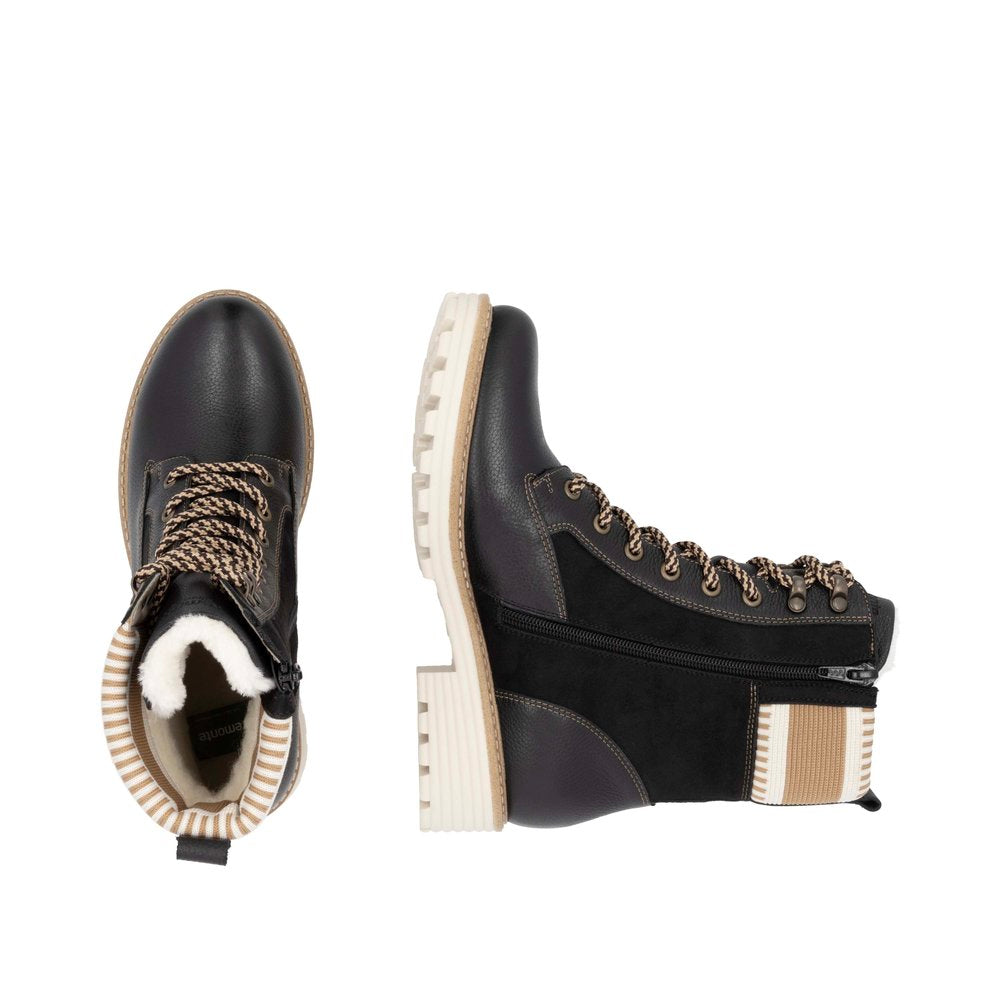 Black ankle-high lace-up boot with beige ribbed detail and zipper.