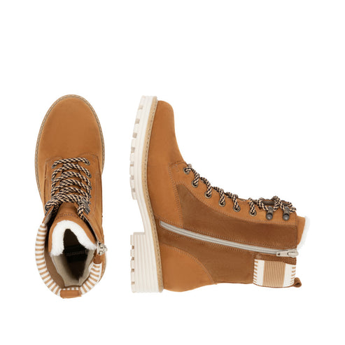 Tan lace-up ankle boots with faux fur collar and side zipper.