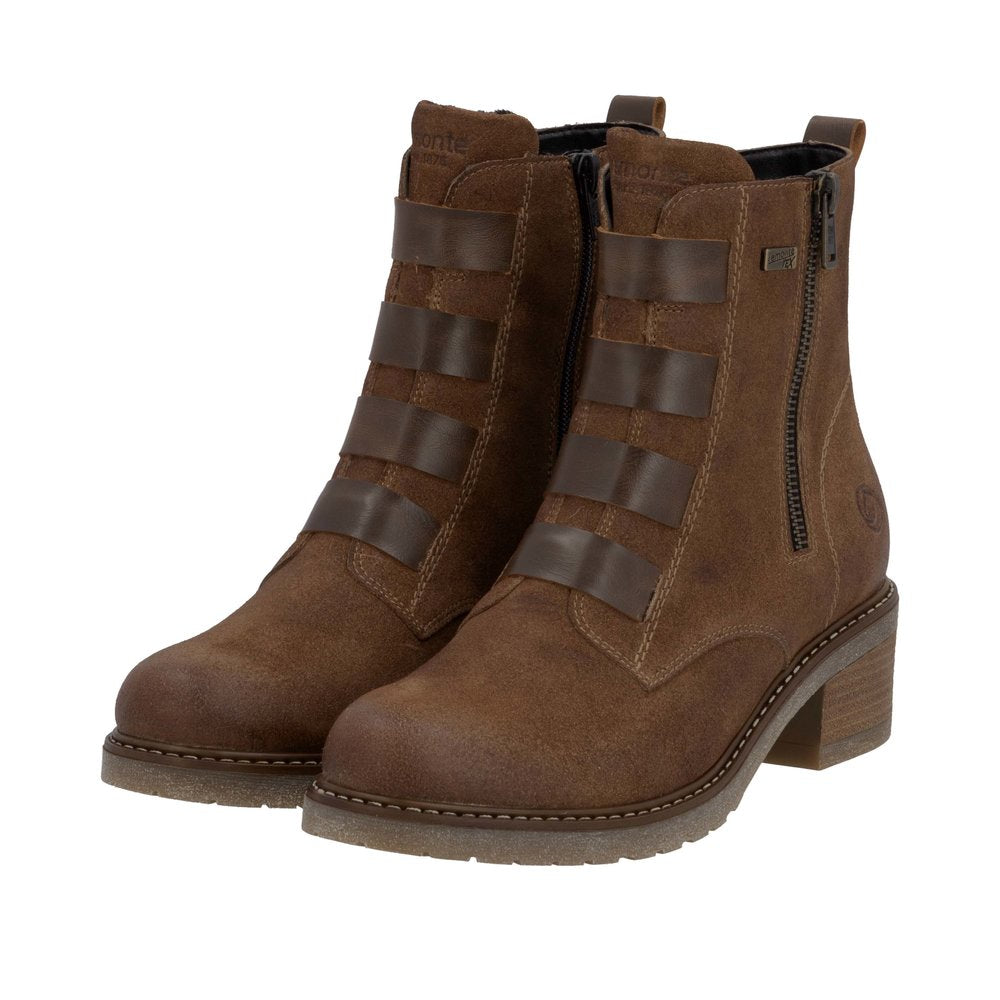 Pair of brown ankle boots with buckle straps and side zipper.