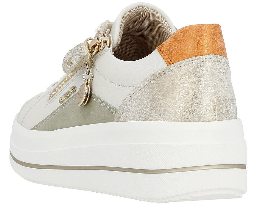 Off-white platform sneaker with a gold heel and heel loop.