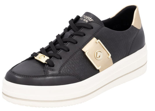 Black leather sneaker with black laces, a gold accent on the side, a gold accent on the heel, and a white platform sole.