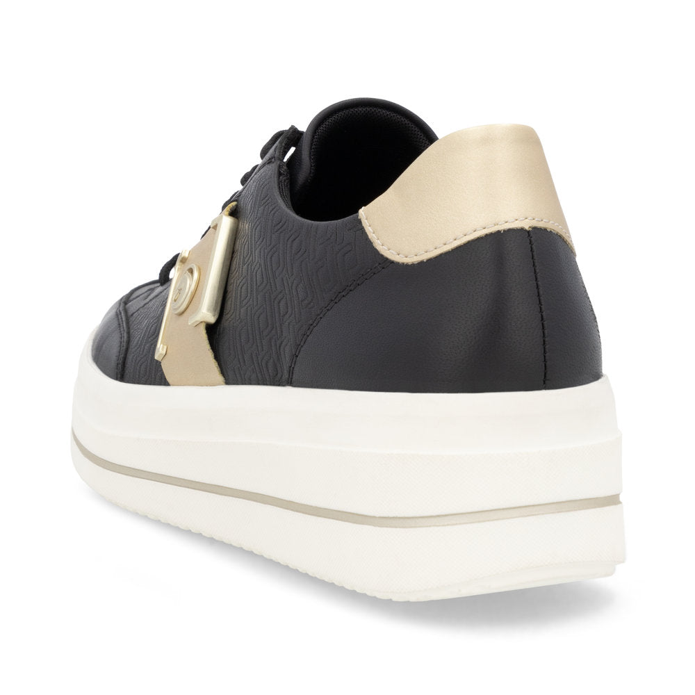 Black and gold sneaker with thick white platform sole.