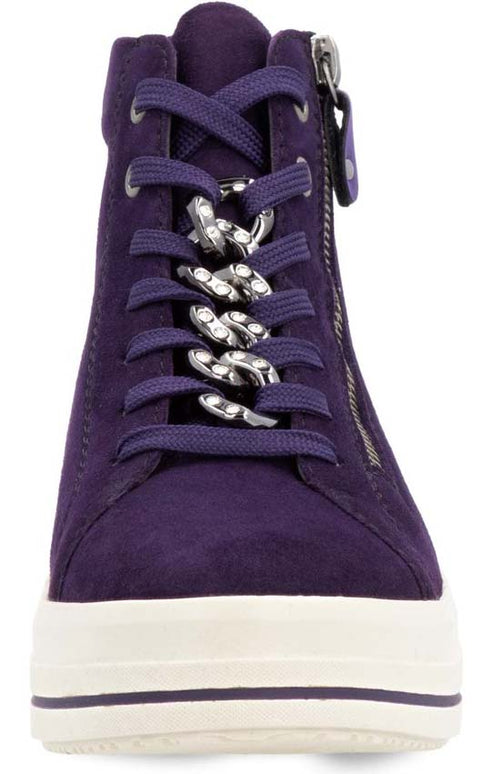 A purple high-top sneaker with a side zipper, white sole, and embellished laces.