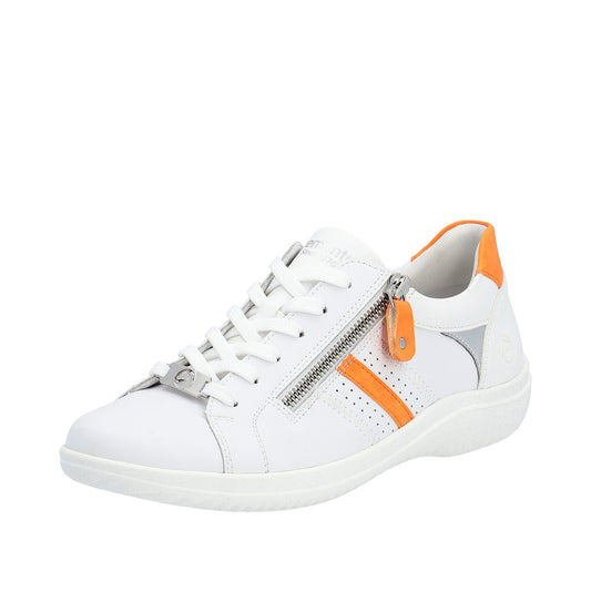 A white leather sneaker with white laces, a silver zipper, and orange accents.