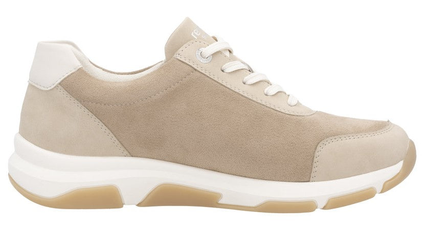 Beige suede sneaker with white laces and platform sole.