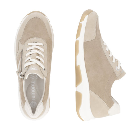 Beige sneakers with white laces and a zipper closure on the side, visible logo "remonte" on the insole.