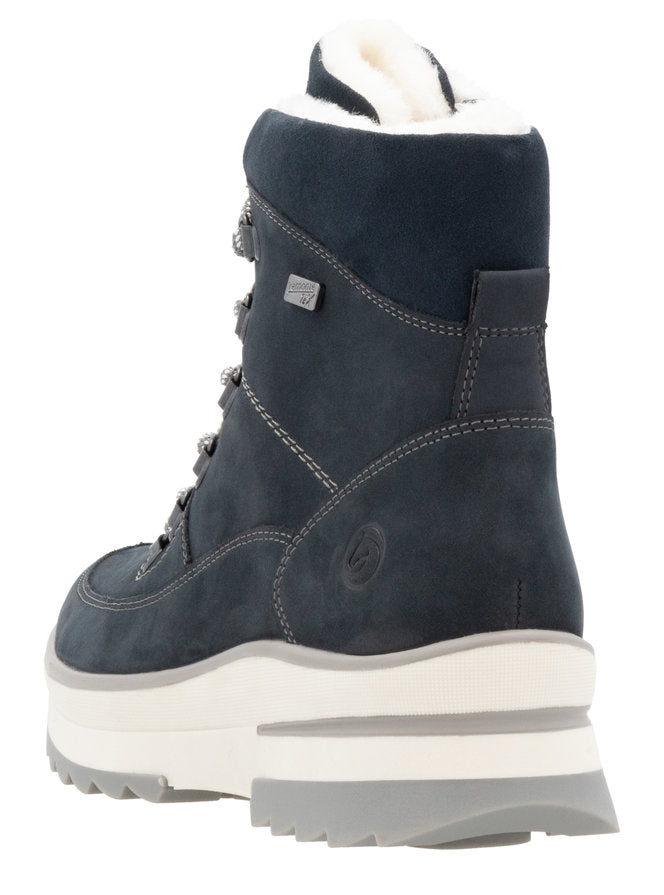 Dark blue, high-top boot with white, layered sole and faux fur lining.