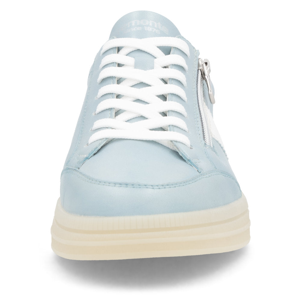 Light blue sneaker with white laces and a zipper on the side. The word "DANI" is visible on the tongue.