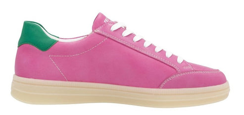 Pink leather sneaker with white laces and a green heel.