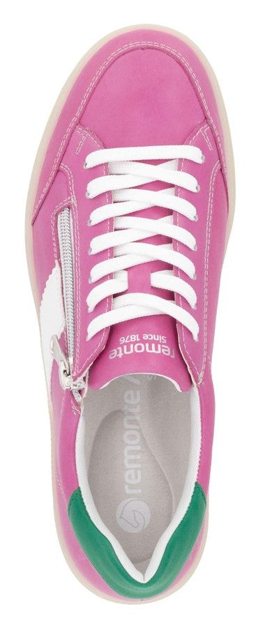 Pink sneaker with white laces, white star detail, and green heel.