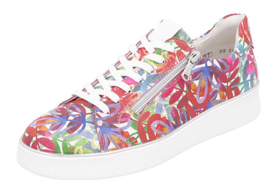 Floral print sneaker with white laces and side zipper, on a white platform sole.