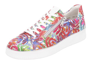 Floral print sneaker with white laces and side zipper, on a white platform sole.