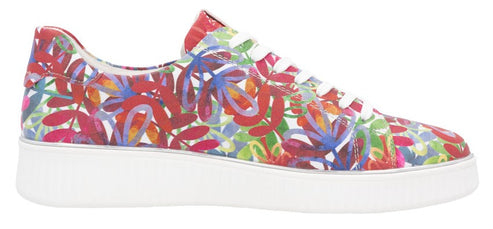 A floral pattern flat sneaker with white laces and a white sole.