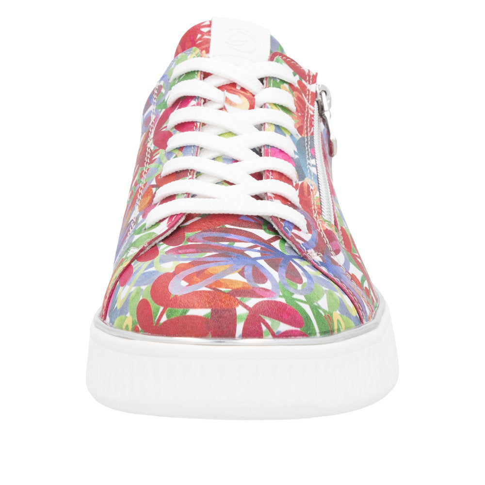 Floral-print sneaker with white laces and platform sole.